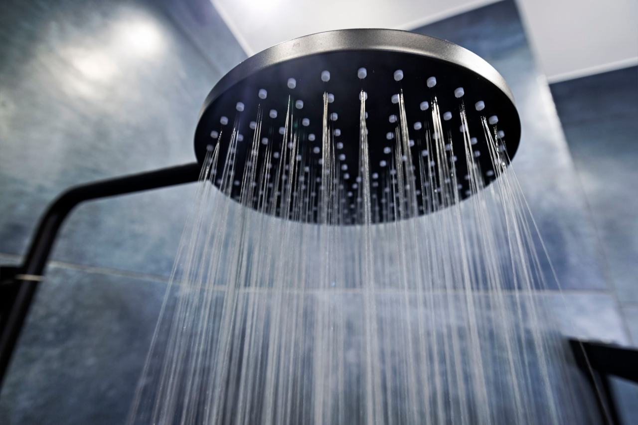 Water running out of a shower head.